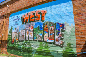 Featuring a traditional postcard style, the West Monroe Mural showcases the area’s most beloved characteristics.\